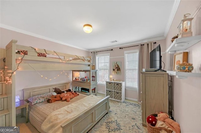 bedroom featuring baseboards, light colored carpet, visible vents, and crown molding