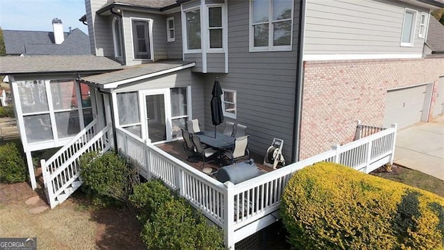 view of property exterior featuring a sunroom