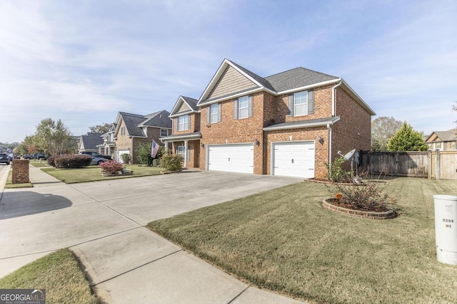 view of front of home featuring a garage and a front lawn