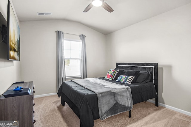 carpeted bedroom featuring ceiling fan and lofted ceiling