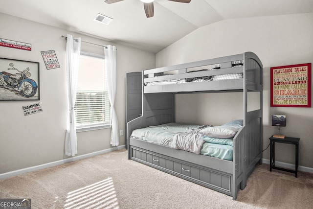 carpeted bedroom featuring ceiling fan and lofted ceiling