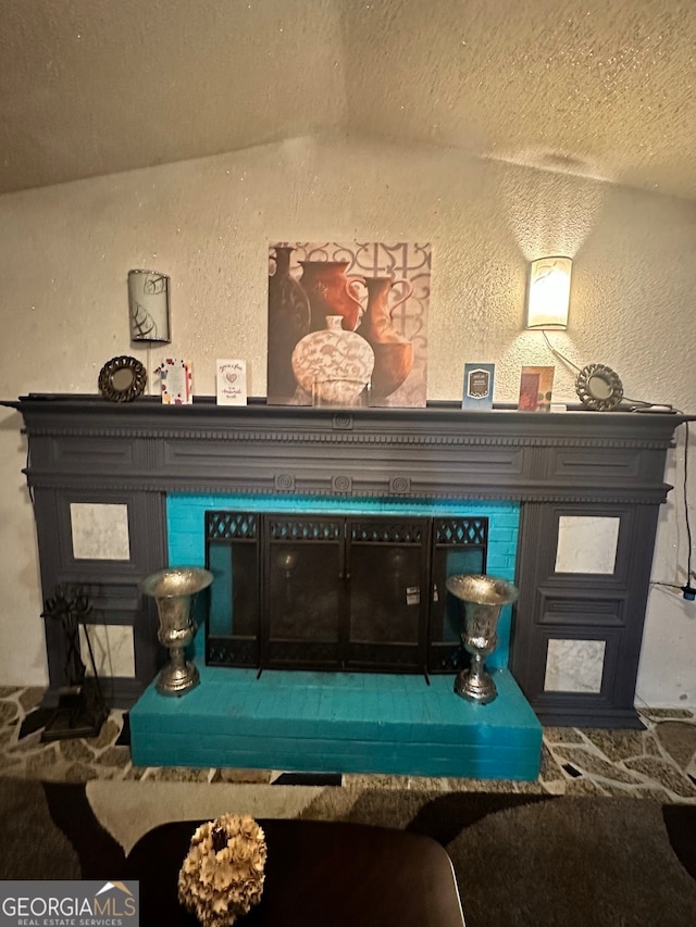 interior details featuring a textured ceiling