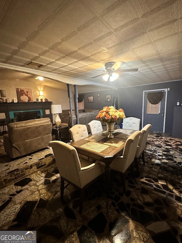 dining room featuring ceiling fan