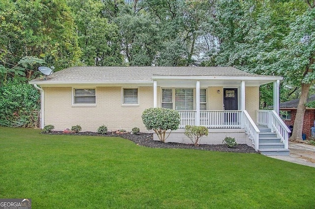 view of front of property with a front lawn and a porch