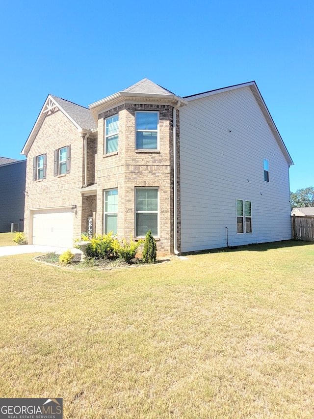 view of front of property with a front lawn, a garage, brick siding, and concrete driveway