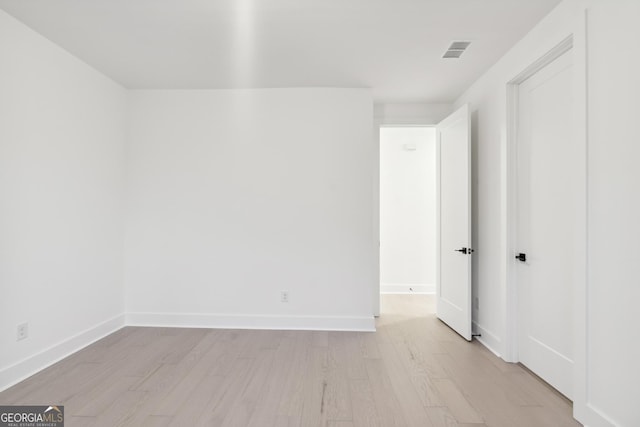 empty room featuring light hardwood / wood-style floors