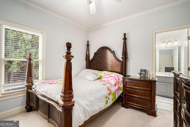 bedroom featuring connected bathroom, ceiling fan, light carpet, and multiple windows