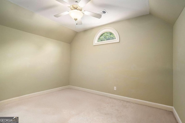 additional living space featuring ceiling fan, carpet floors, and vaulted ceiling