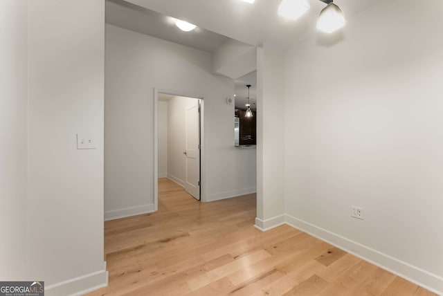 empty room featuring hardwood / wood-style flooring