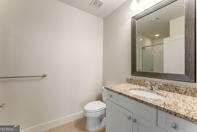 bathroom with walk in shower, tile patterned floors, toilet, and vanity