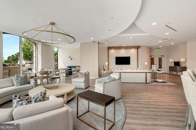 living room with light hardwood / wood-style floors