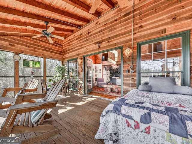 unfurnished bedroom with wood walls, wooden ceiling, high vaulted ceiling, beam ceiling, and wood-type flooring