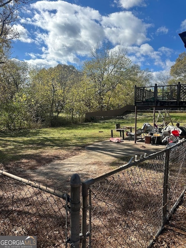 view of yard with a deck