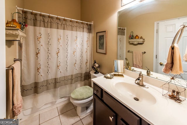 bathroom with tile patterned floors, vanity, toilet, and a shower with shower curtain