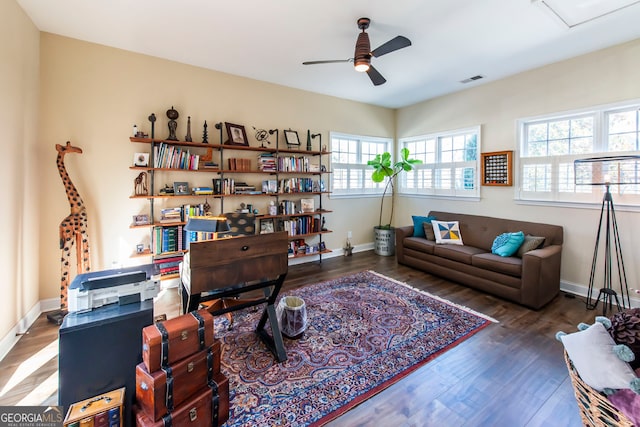 office area featuring ceiling fan and dark wood-type flooring