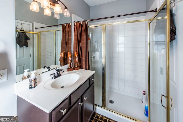 bathroom with vanity and an enclosed shower