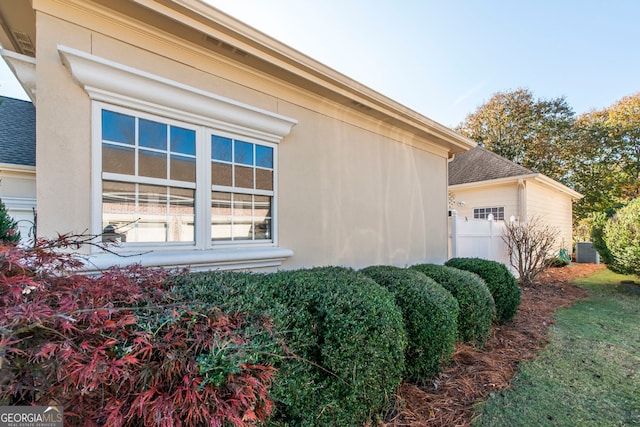 view of property exterior featuring central AC