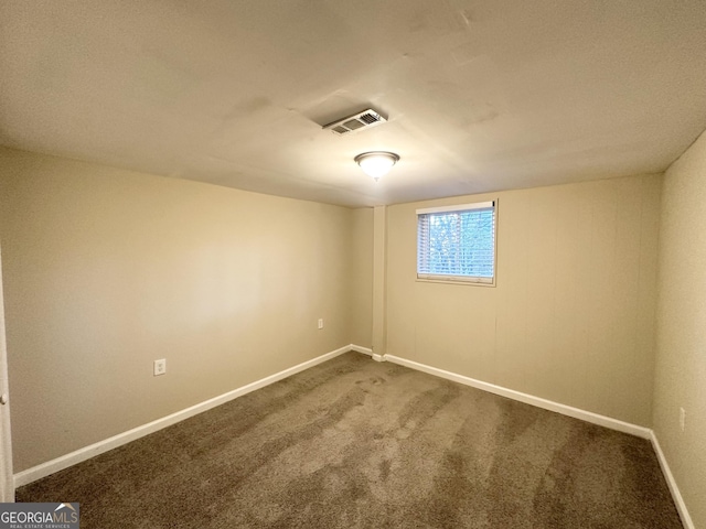 unfurnished room featuring carpet flooring