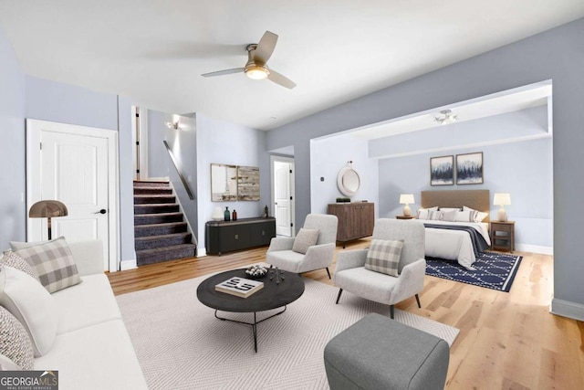 bedroom with hardwood / wood-style flooring and ceiling fan