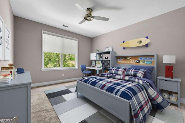 carpeted bedroom featuring ceiling fan