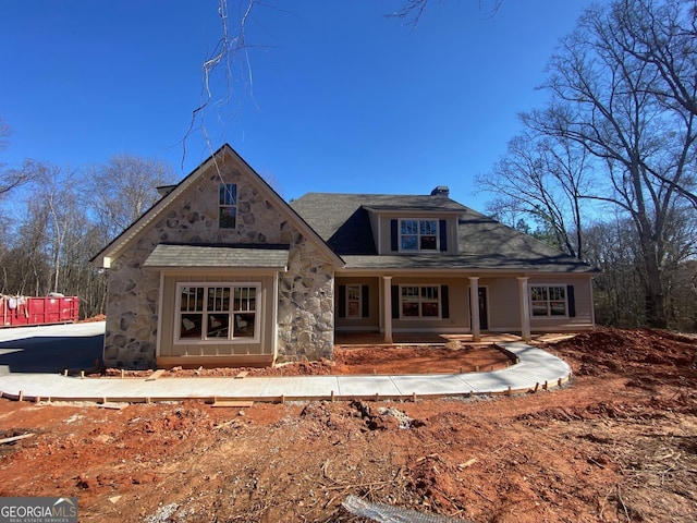 view of front of property featuring covered porch