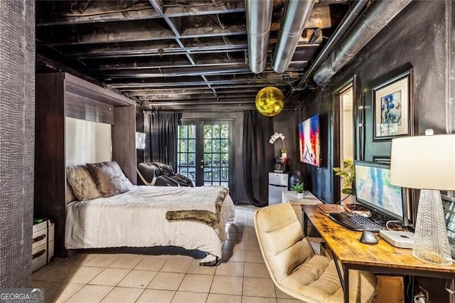 bedroom with french doors and tile patterned flooring