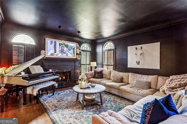 bar featuring crown molding and hardwood / wood-style flooring