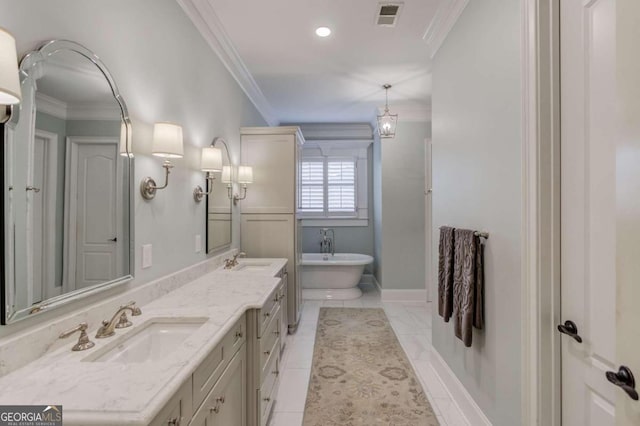 bathroom featuring tile patterned flooring, a washtub, ornamental molding, and vanity