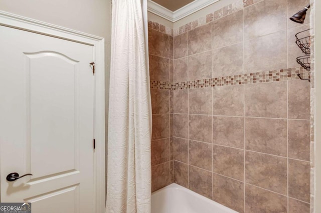 bathroom featuring shower / bath combo and ornamental molding