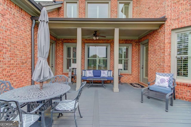 wooden terrace with ceiling fan