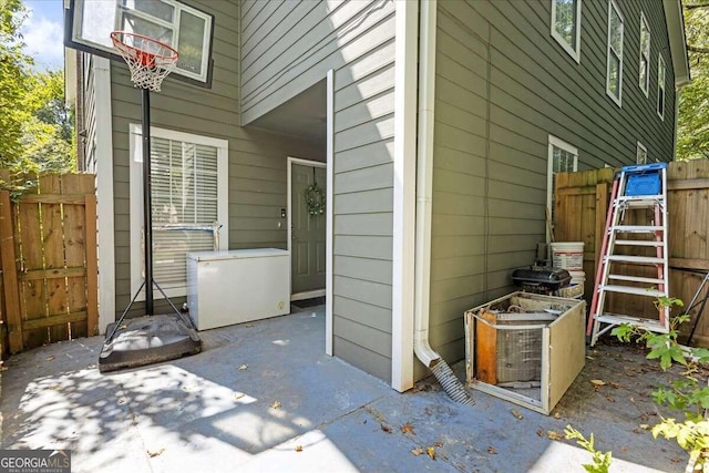 view of side of property featuring a patio