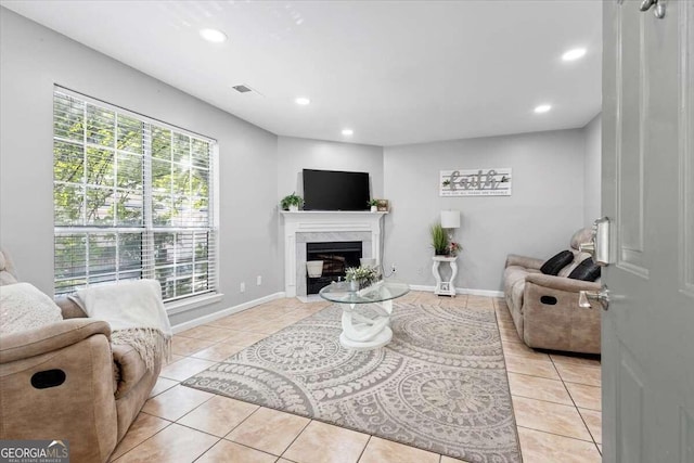 living room with light tile patterned floors