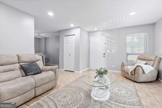 living room with light tile patterned flooring