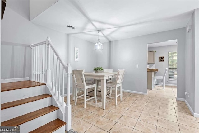 view of tiled dining space