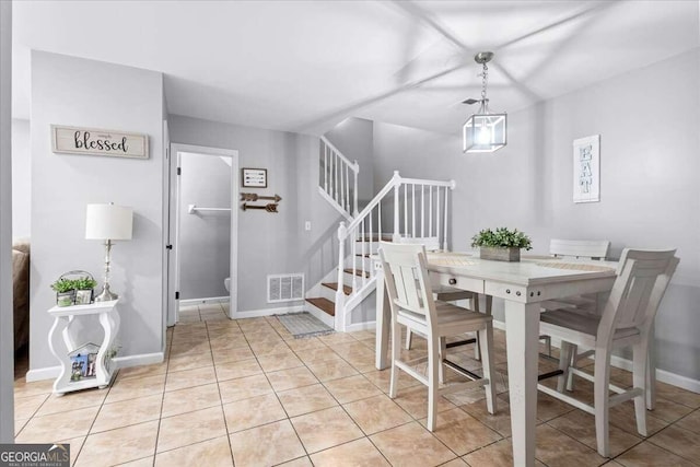 dining room with light tile patterned floors