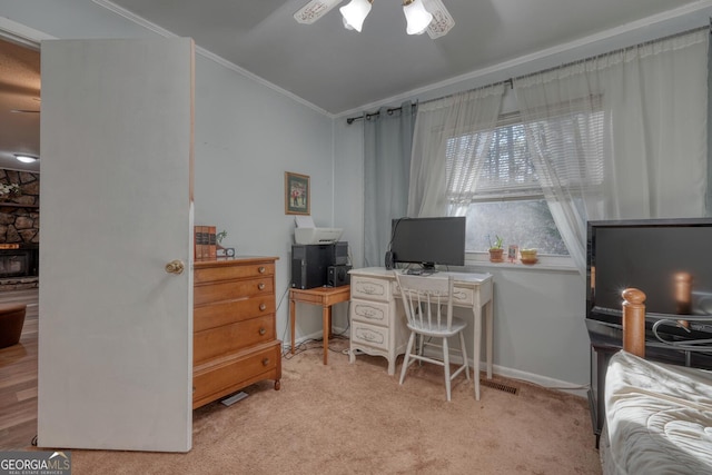 carpeted office with ceiling fan and ornamental molding