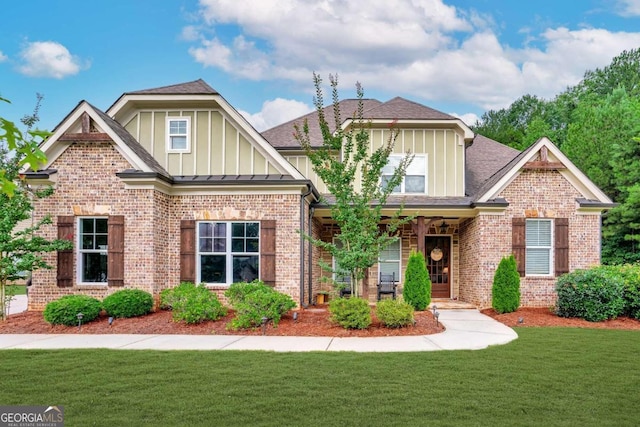 craftsman-style home with a front lawn