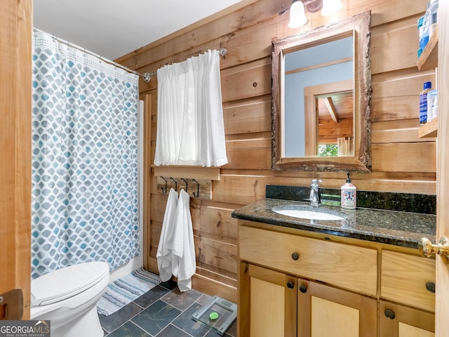 bathroom with a shower with shower curtain, vanity, toilet, and wooden walls