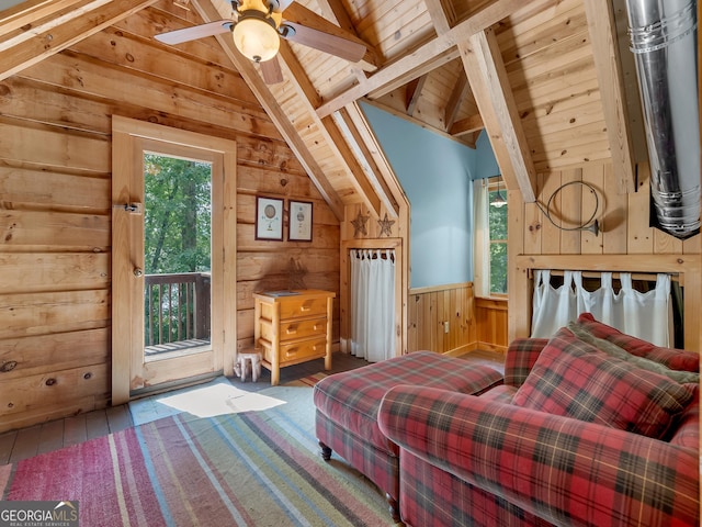 bedroom featuring access to outside, ceiling fan, wooden ceiling, vaulted ceiling with beams, and wood walls