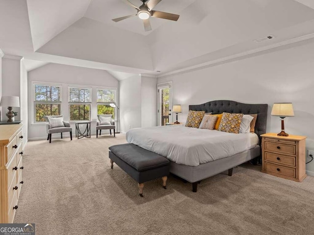 carpeted bedroom featuring ceiling fan, vaulted ceiling, and ornamental molding