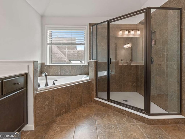 bathroom featuring plus walk in shower