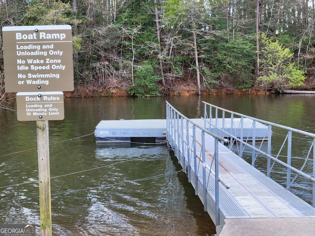 dock area featuring a water view