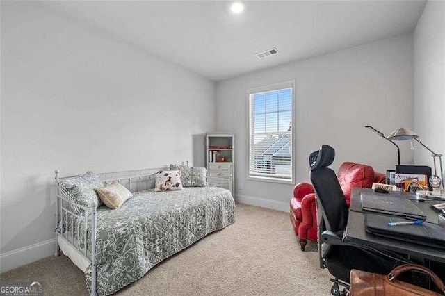 bedroom featuring carpet