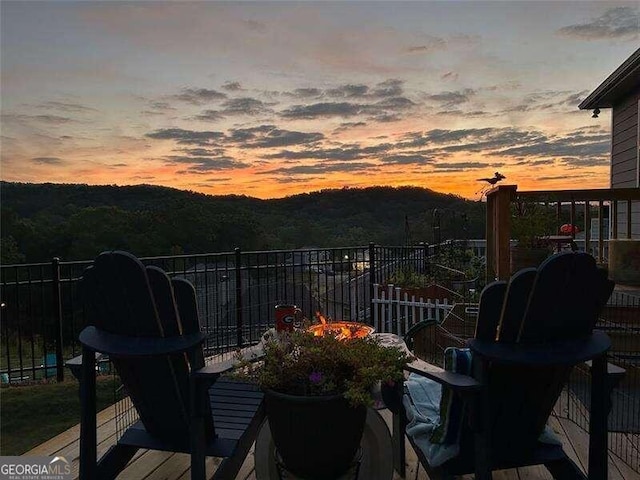 view of balcony at dusk