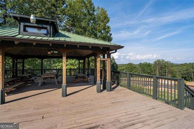 wooden deck with a gazebo