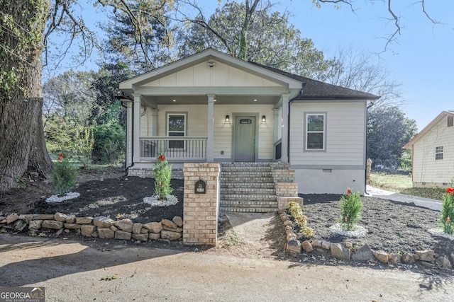 bungalow-style home featuring covered porch