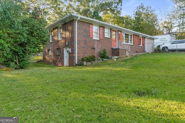 view of front of property with a front lawn