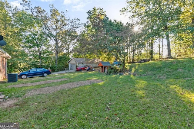 view of yard with a garage