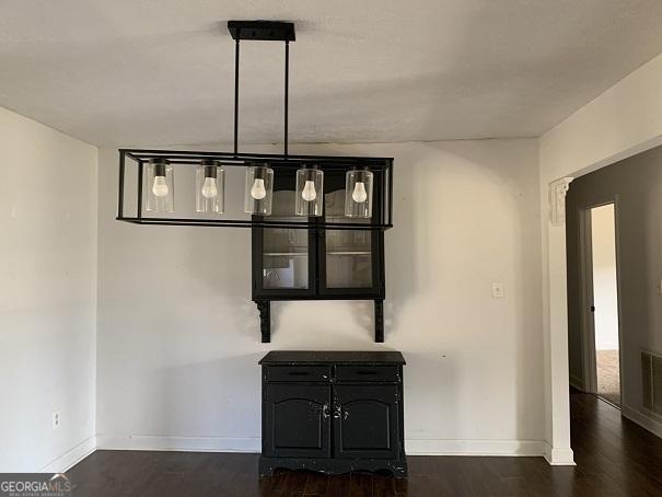 interior details featuring hardwood / wood-style floors