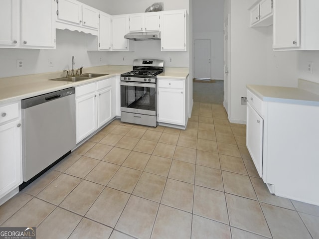 kitchen featuring white cabinetry, sink, and appliances with stainless steel finishes